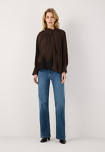 Load image into Gallery viewer, Blouse with tie neck and lace hem