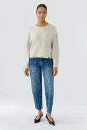 Pullover with deep-set raglan and overlapping vent in high hem